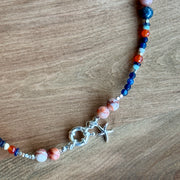 COLLAR NARCISO CORTO AZUL/NARANJO