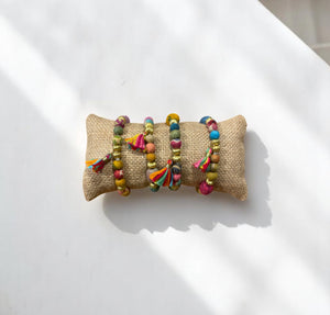 PULSERA TELA S BORLAS