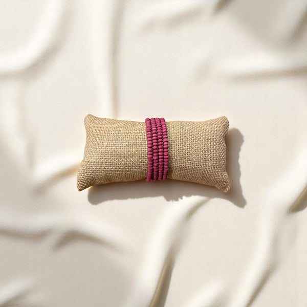 PULSERA MADERA ESPIRAL FUCSIA